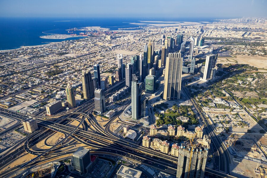 aerial-view-dubai-city-from-top-tower_268835-1058